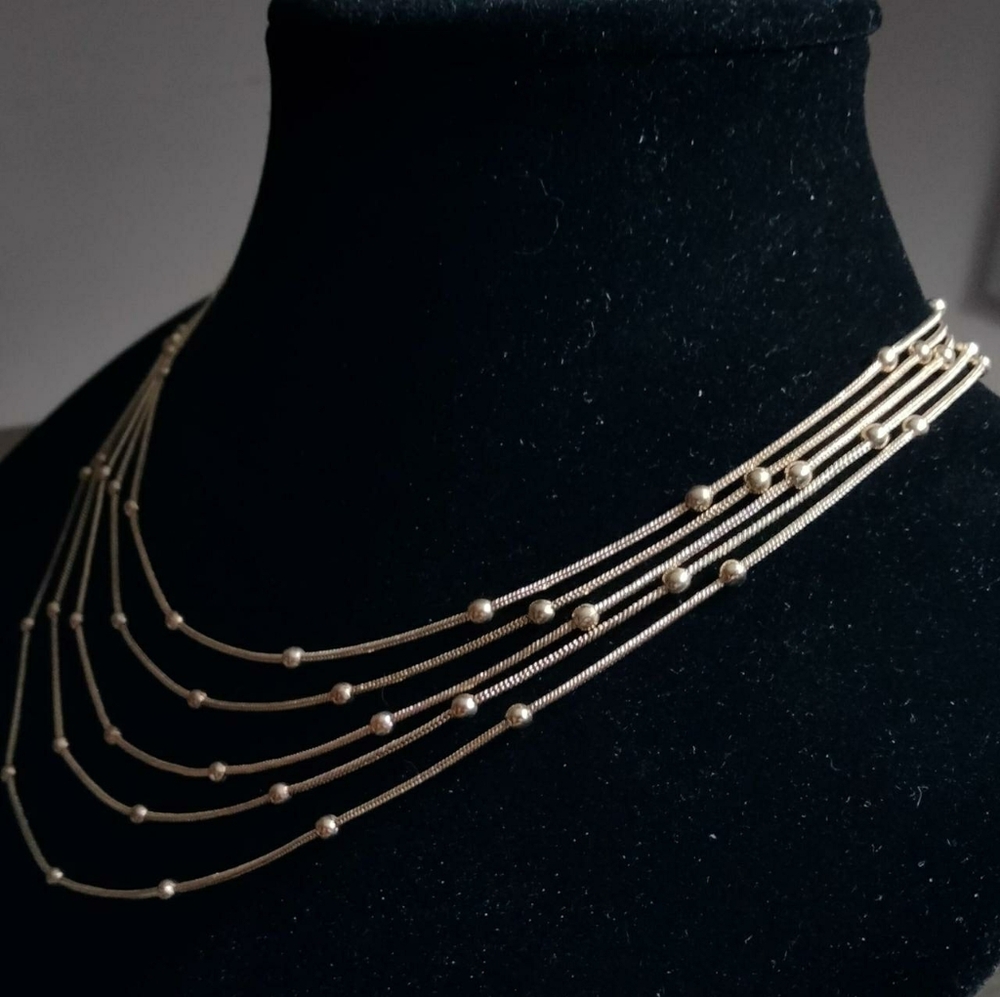 Elegant Golden Layered Necklace With Beads And Extender